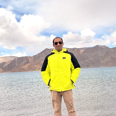 Rajender Singh Bisht, contributor and event verifier for HotelsInHaldwani, photographed at Pangong Lake in Ladakh